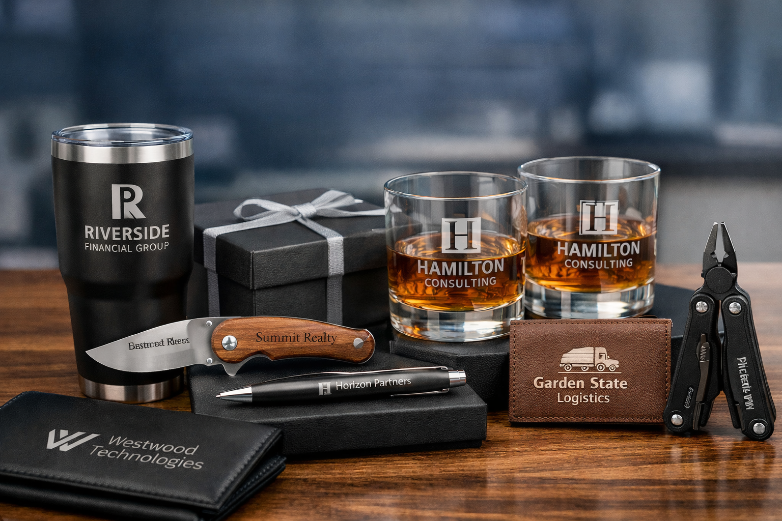 NJ corporate engraved gifts featuring custom engraved tumblers, barware, knives, pens, and leather accessories for business gifting